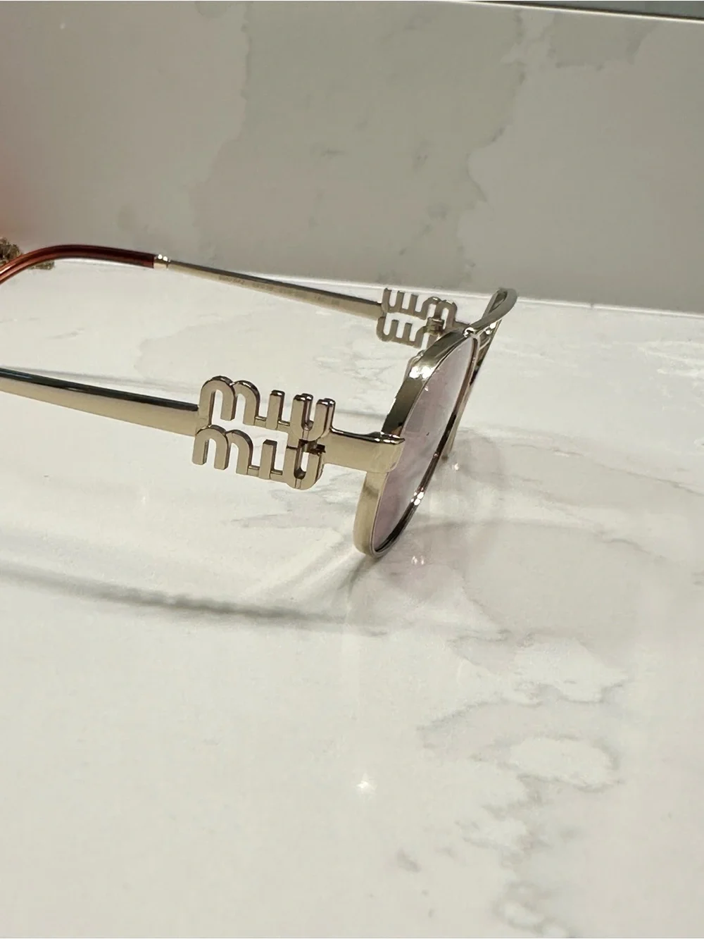 Miu Miu Gold Frame Sunglasses with Pink Lenses